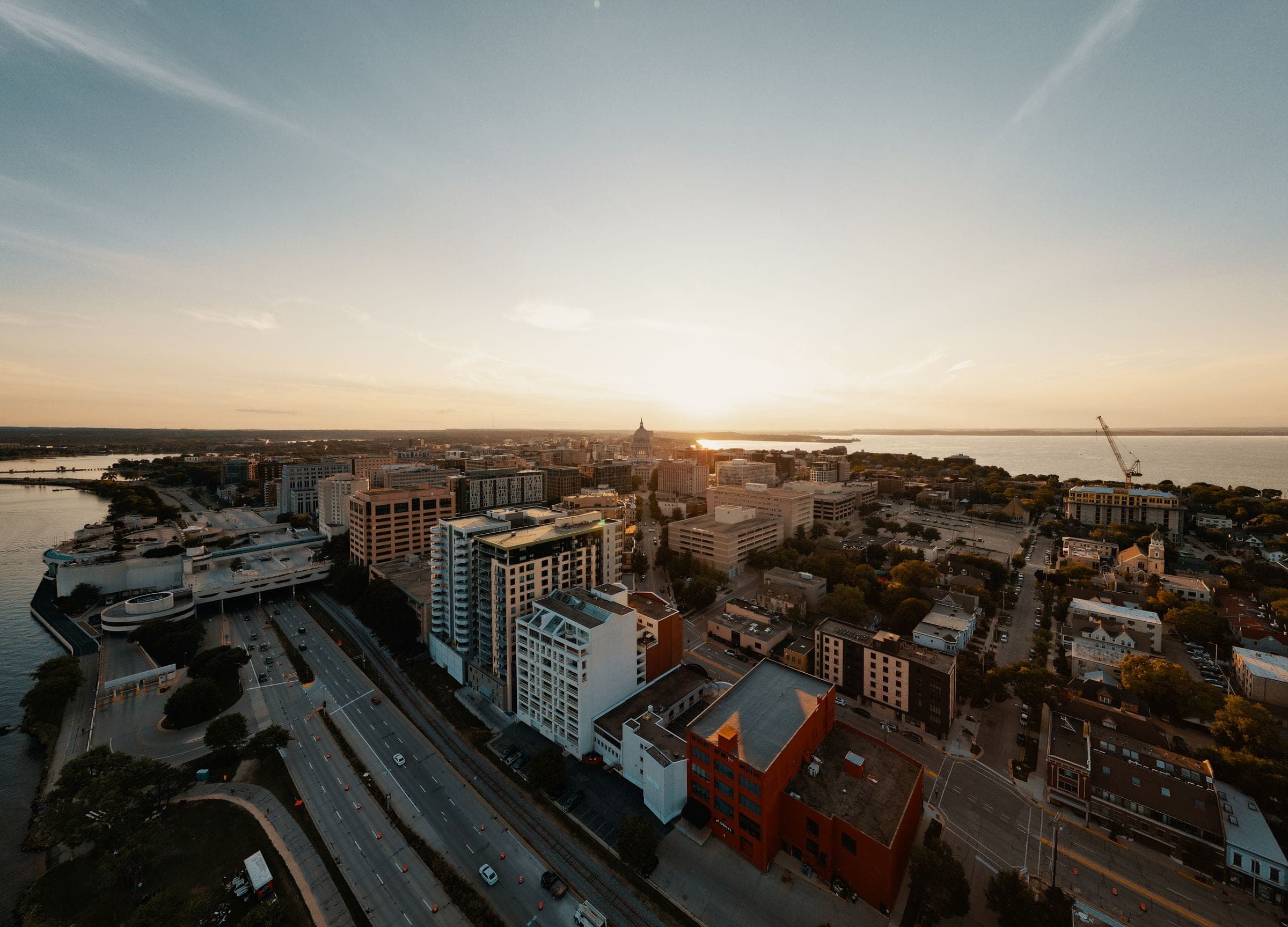 Aerial view of a Wisconsin city and its lakefront at sunset